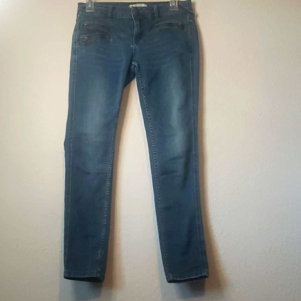 Free People Mid rise skinny jeans.